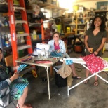 Our Staffing Coordinator Andrea making masks for healthcare workers with her family and neighbor!