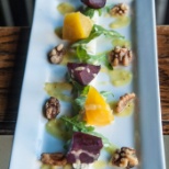 Red and Gold Beets with Herbed Goat Chhese Mousse Local Arugula and Candied Walnuts