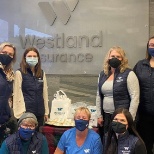 Celebrating their first official day as Westland Insurance.