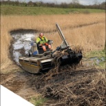 Northern Operations team carrying out restoration work on a pond