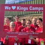 Coaches holding Kings Camps selfie frame