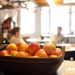 We keep fresh fruit and healthy snacks (along with a few indulgences...) stocked in our offices.